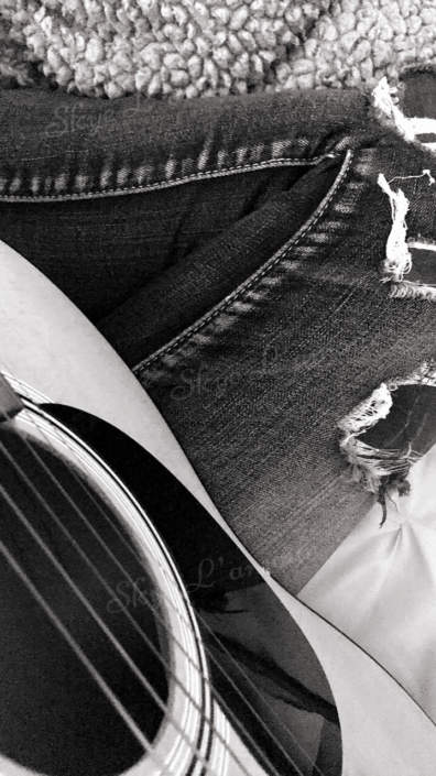 Photograph of Jeans and Guitar by Skye Lamour